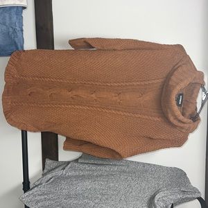 Burnt orange turtle neck, 3 quarter length sleeves